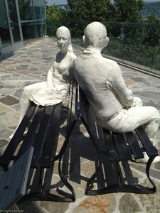 Couple On Two Benches